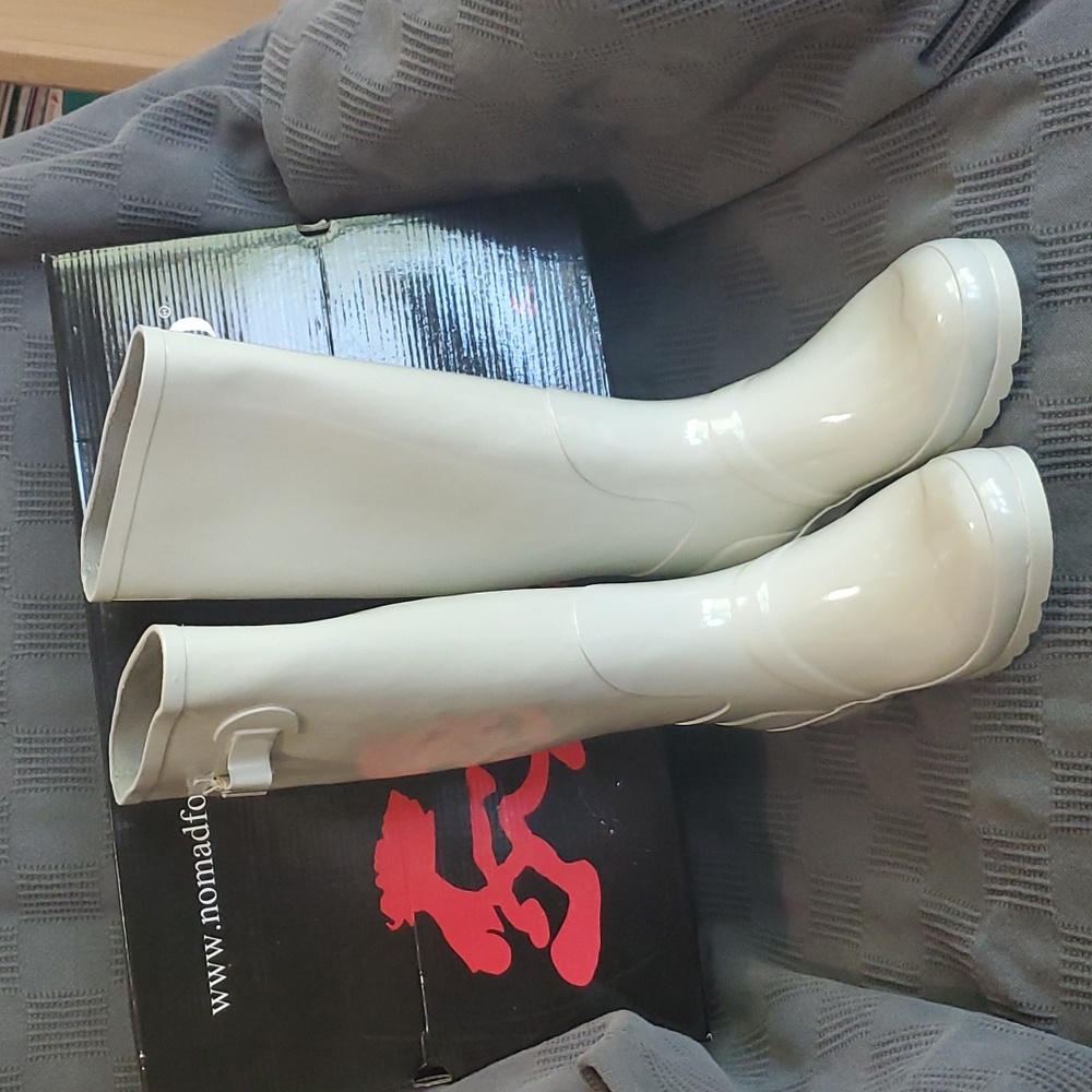 Rain boots never worn, beige even though they look white
